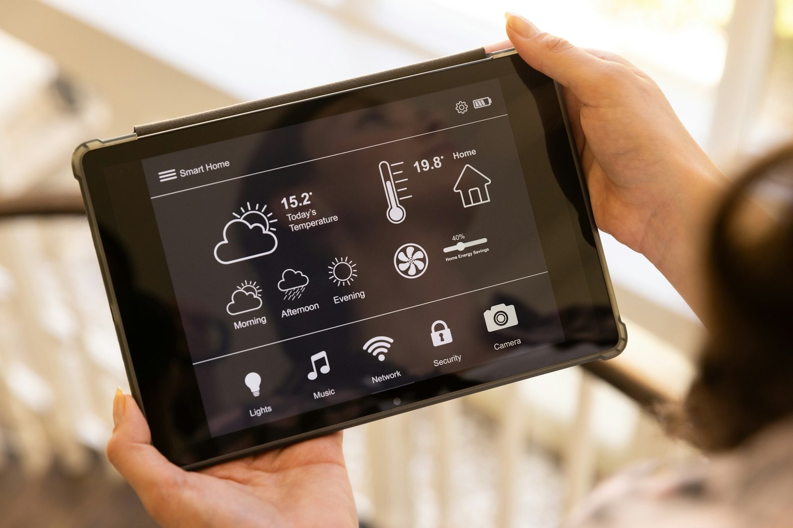 Using tablet to control smart home system, adjusting temperature and settings